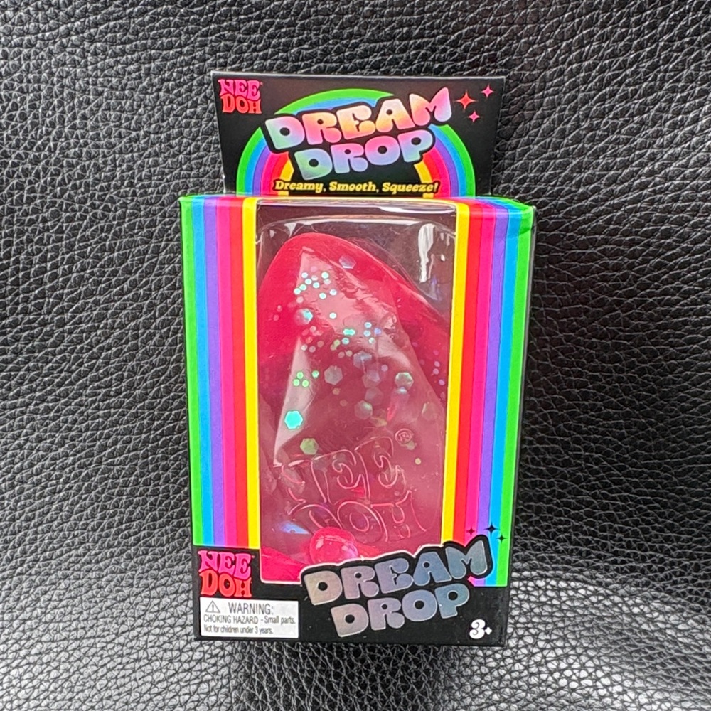 NeeDoh Dream Drop Squeeze Toy in Hot Pink with Glitter